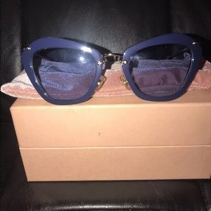 Miu miu woman’s cat eye sunglasses blue/gold